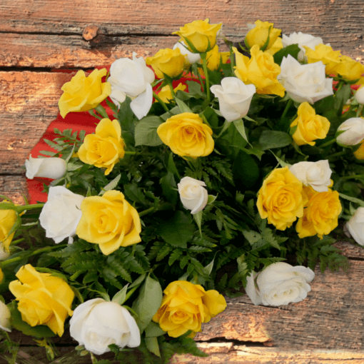 Cuscino funebre copribara rose gialle e bianche